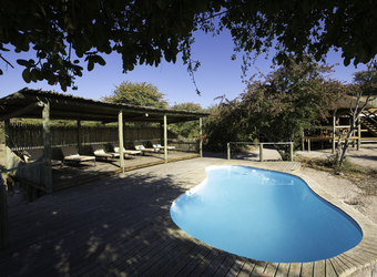 Khalahari Plains Camp, en suite bathroom, large shower with window for animal viewing, shiny hardwood floors, double fish bowl sinks, Africa, Botswana